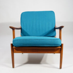 A pair of reupholstered easy chairs in teak by Bramin, Denmark.