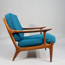 A pair of reupholstered easy chairs in teak by Bramin, Denmark.