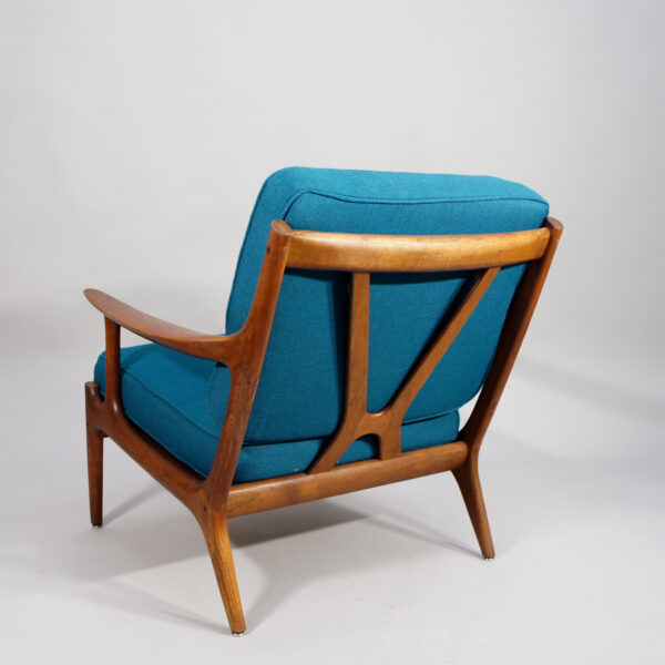 A pair of reupholstered easy chairs in teak by Bramin, Denmark.