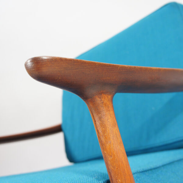 A pair of reupholstered easy chairs in teak by Bramin, Denmark.