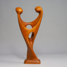 Sculpture of dancing couple in teak by Simon Rander, Denmark.