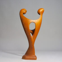 Sculpture of dancing couple in teak by Simon Rander, Denmark.