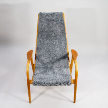 Yngve Ekström for Svedese, Sweden. "Lamino" 1950's easy chair in oak, teak and reupholstered in grey sheep skin.