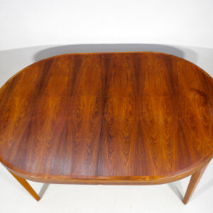 1960's dining table in rosewood with two extension boards.