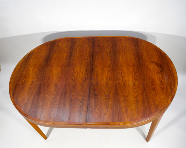 1960's dining table in rosewood with two extension boards.