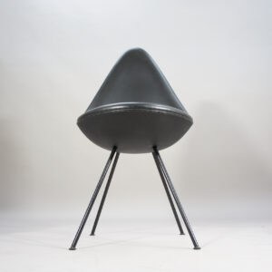 Arne Jacobsen for Fritz Hansen, Denmark. Mod 3110 "The Drop Chair" in black leather .