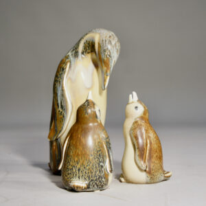 Gunnar Nylund for Rörstrand, Sweden. Pinguine with two babys in stoneware.