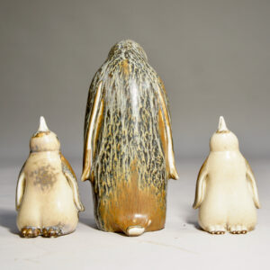 Gunnar Nylund for Rörstrand, Sweden. Pinguine with two babys in stoneware.