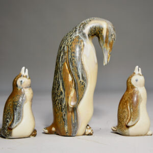 Gunnar Nylund for Rörstrand, Sweden. Pinguine with two babys in stoneware.