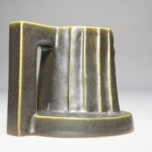 Ceramic candle holder with face in art deco style
