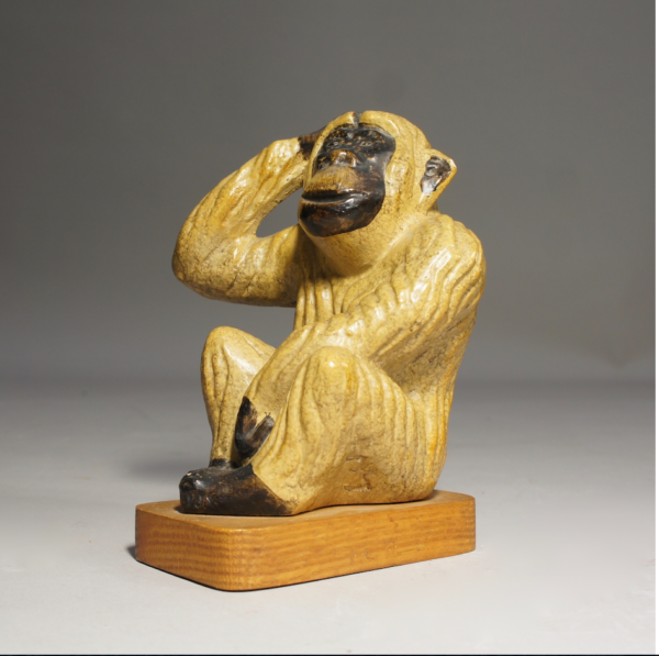 1940-50's sculptural ceramic monkey on wooden base