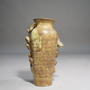 Ceramic vase with fish decorations by Christopher Crete.