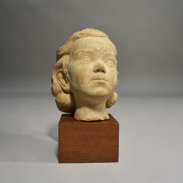 Cereamic sculpture of young girl on base of wood