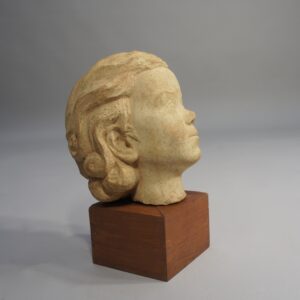 Cereamic sculpture of young girl on base of wood