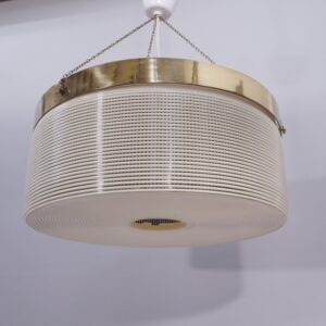 1960's ceiling lamp in plastic and brass.