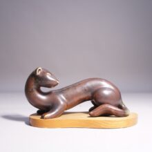 Gunnar Nylund for Rörstrand. 1950's signed Mink in stoneware on base in wood. Minkfigurin av Gunnar Nylund