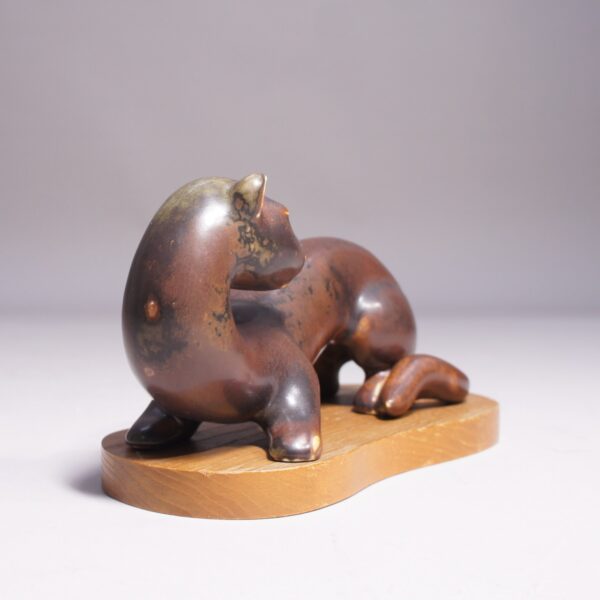 Gunnar Nylund for Rörstrand. 1950's signed Mink in stoneware on base in wood. Minkfigurin av Gunnar Nylund