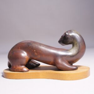 Gunnar Nylund for Rörstrand. 1950's signed Mink in stoneware on base in wood. Minkfigurin av Gunnar Nylund