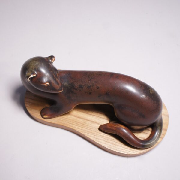 Gunnar Nylund for Rörstrand. 1950's signed Mink in stoneware on base in wood. Minkfigurin av Gunnar Nylund